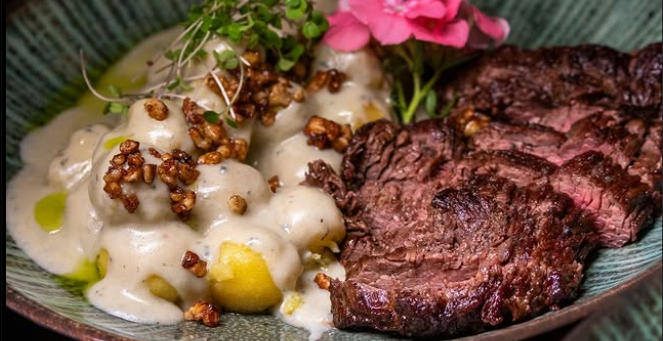 5,4kmSteakhouse com cortes premium na brasa e acompanhamentos.